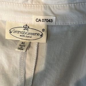 Cute white blouse with bow at back